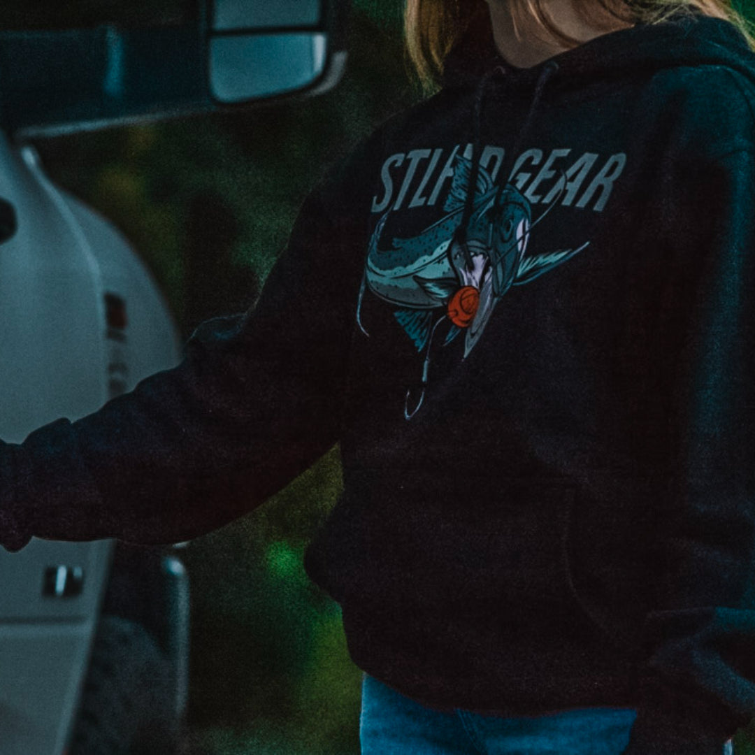 Person wearing a STLHD Chrome Chomper Hoodies